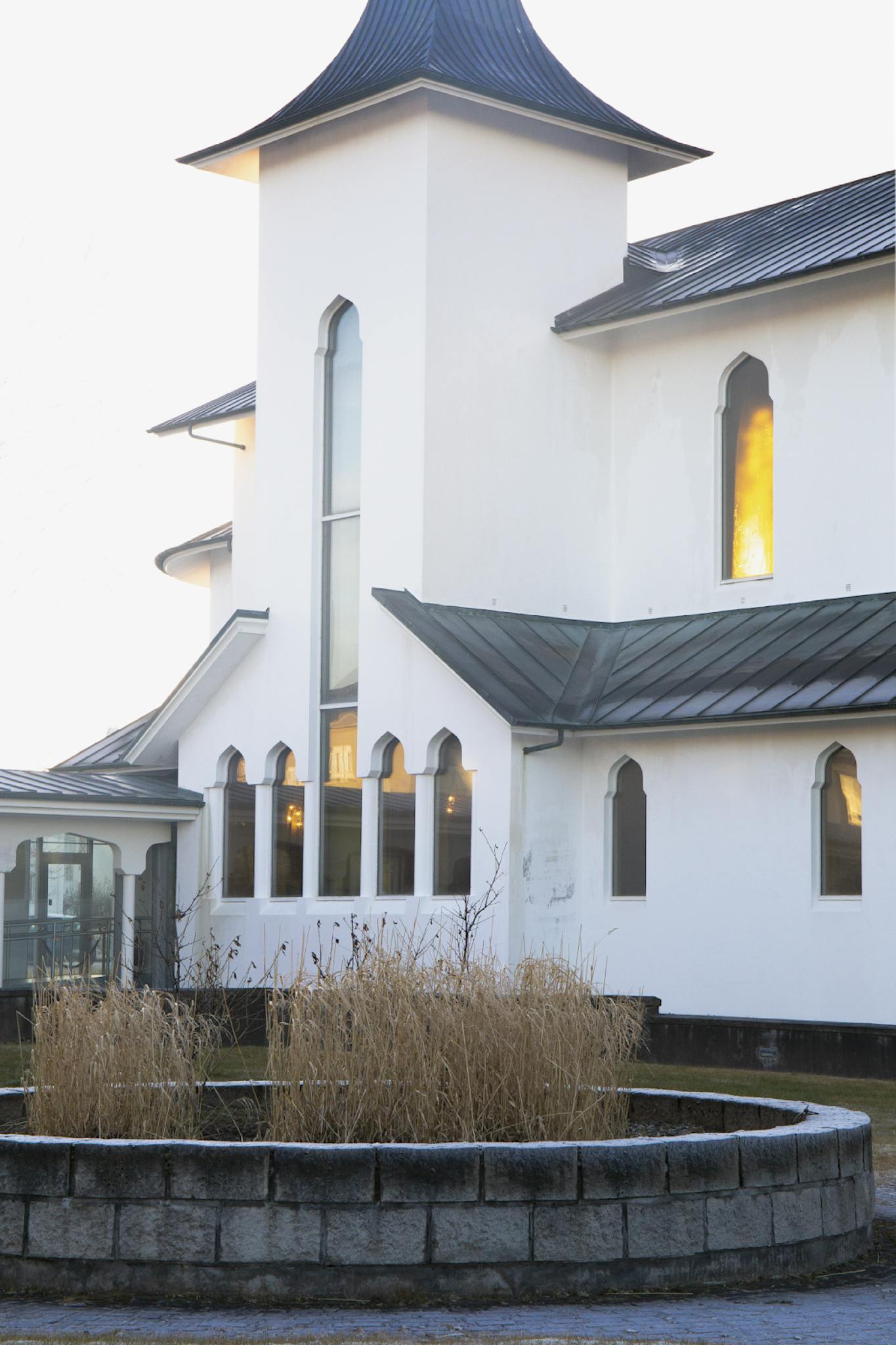 A contemporary church facade in Reykjavik, Iceland, captured in soft light.